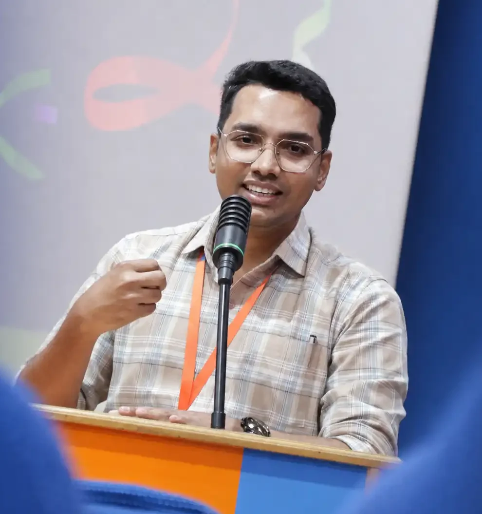 Image of Corporate Trainer and Motivational Speaker, Shri Anandhu Sudheer on stage
